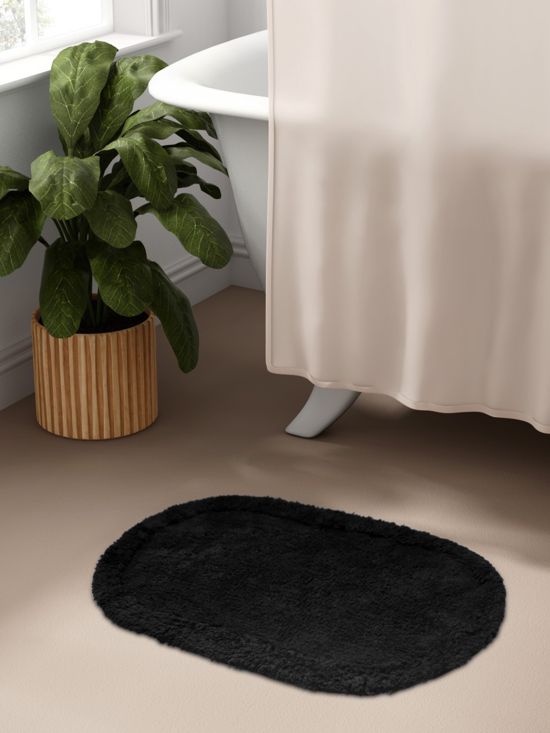 

Aura Black Self Design 1300 GSM Cotton Oval Bath Rug