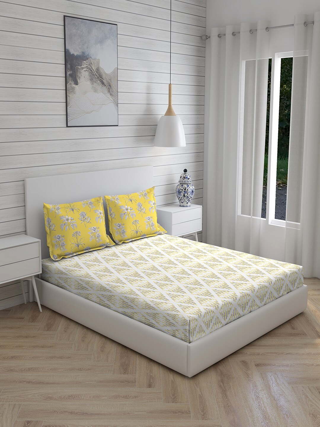 

Layers Yellow & White Geometric Printed 144 TC King Size Bedsheet With 2 Pillow Covers