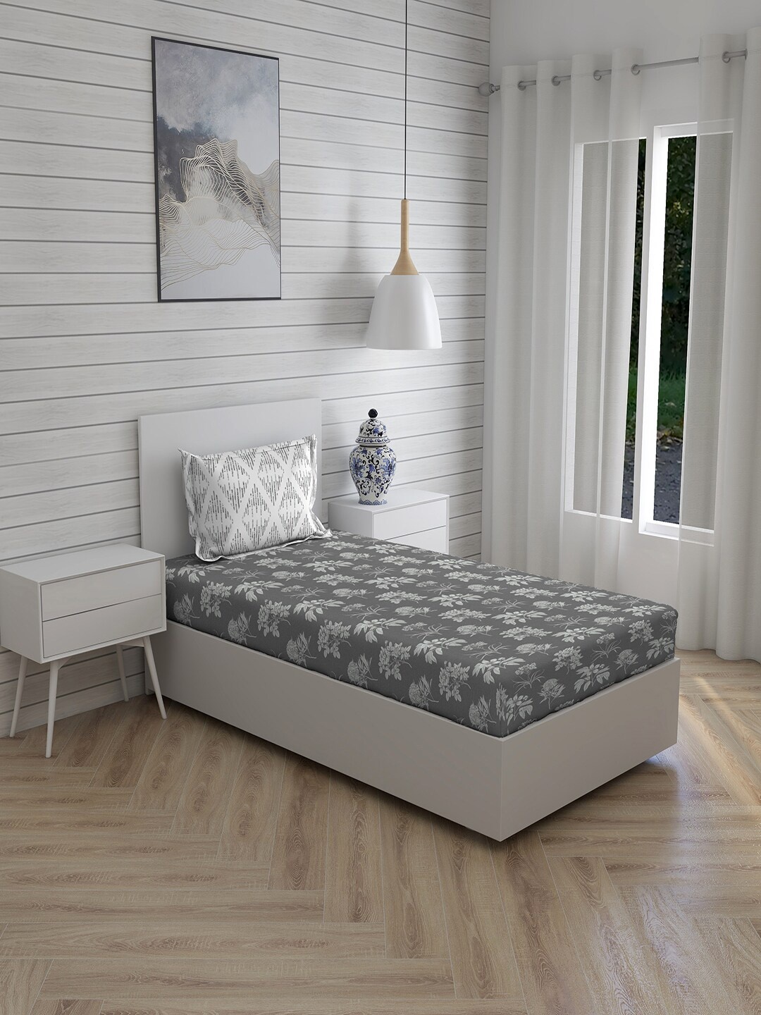 

Layers Grey & White Floral 144 TC Single Bedsheet with 1 Pillow Covers