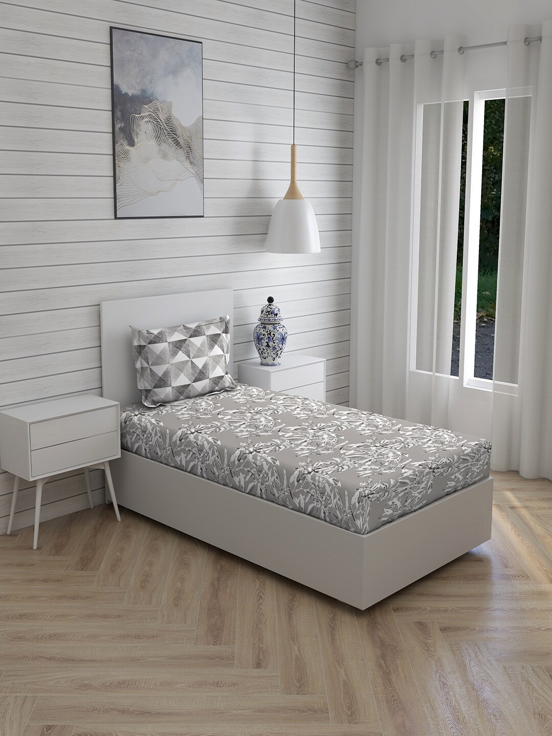 

Layers Grey & White Floral Printed 144 TC Single Bedsheet With 1 Pillow Covers