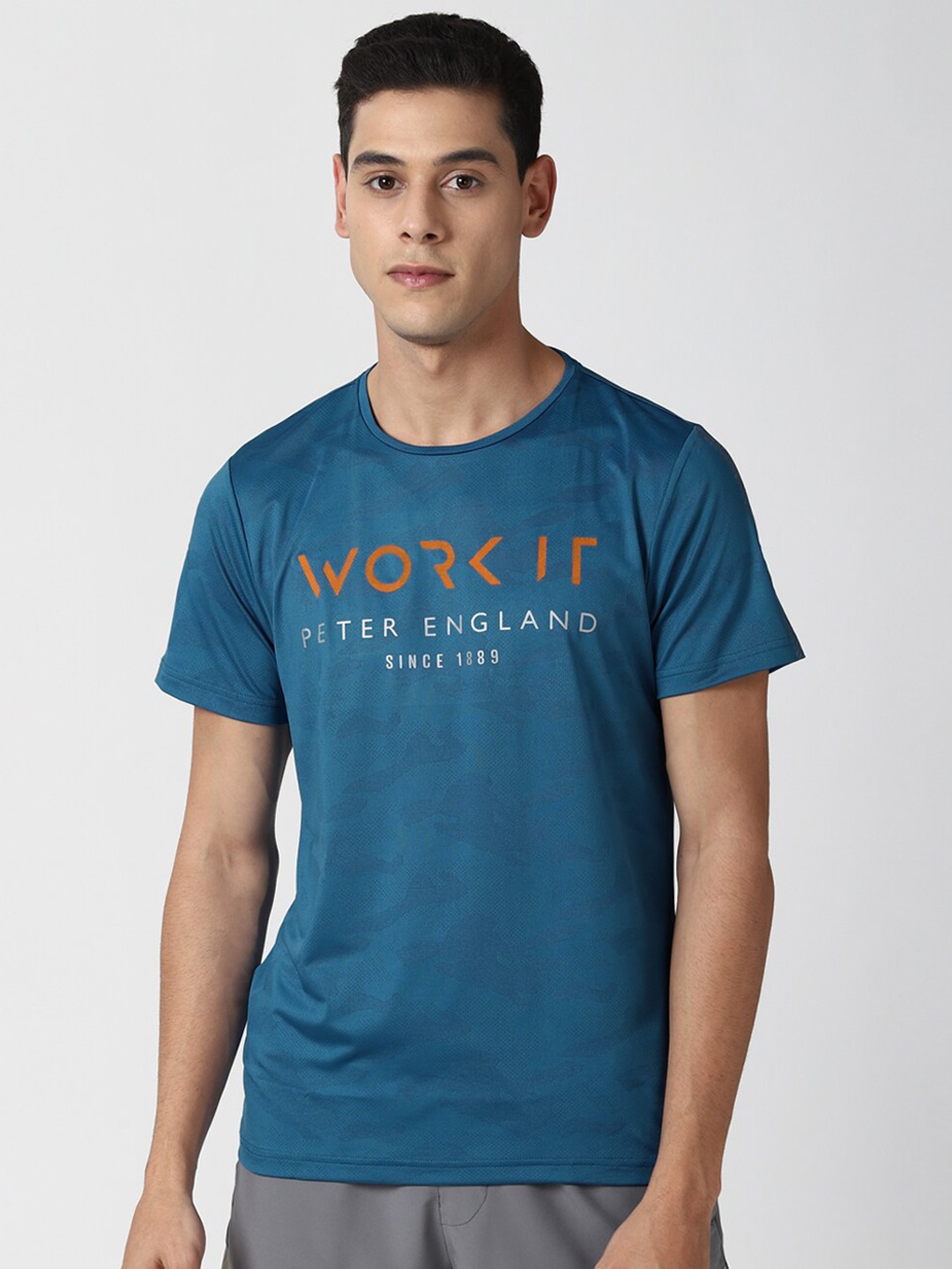 

Peter England Men Teal Blue Typography Printed T-shirt