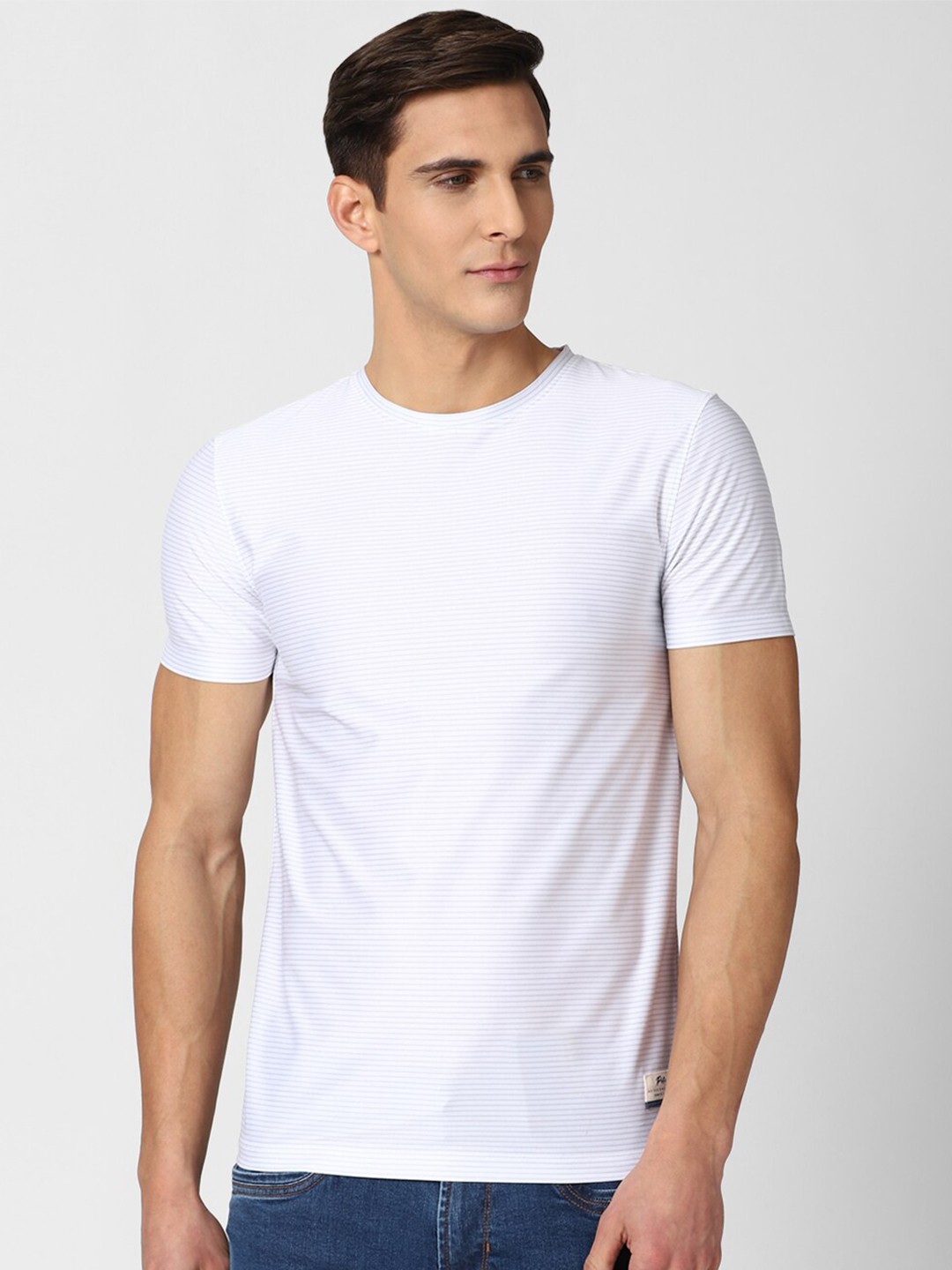 

Peter England Casuals Men White Raw Edge Slim Fit T-shirt