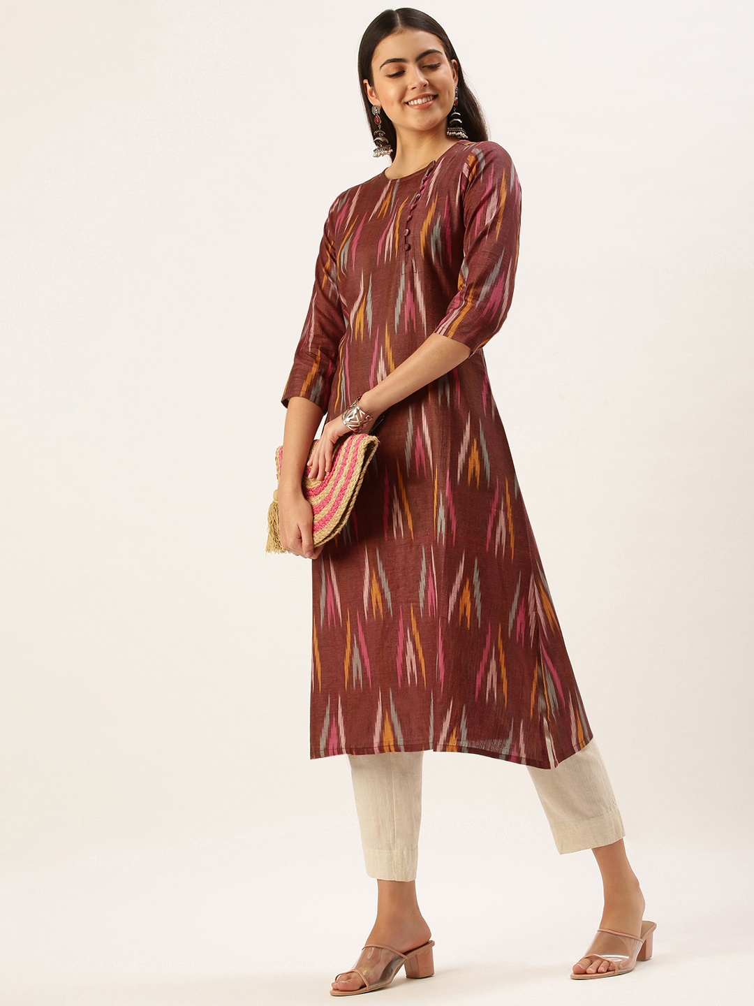 

Saanjh Women Maroon & Yellow Ethnic Motifs Ikat Print Cotton Straight Kurta