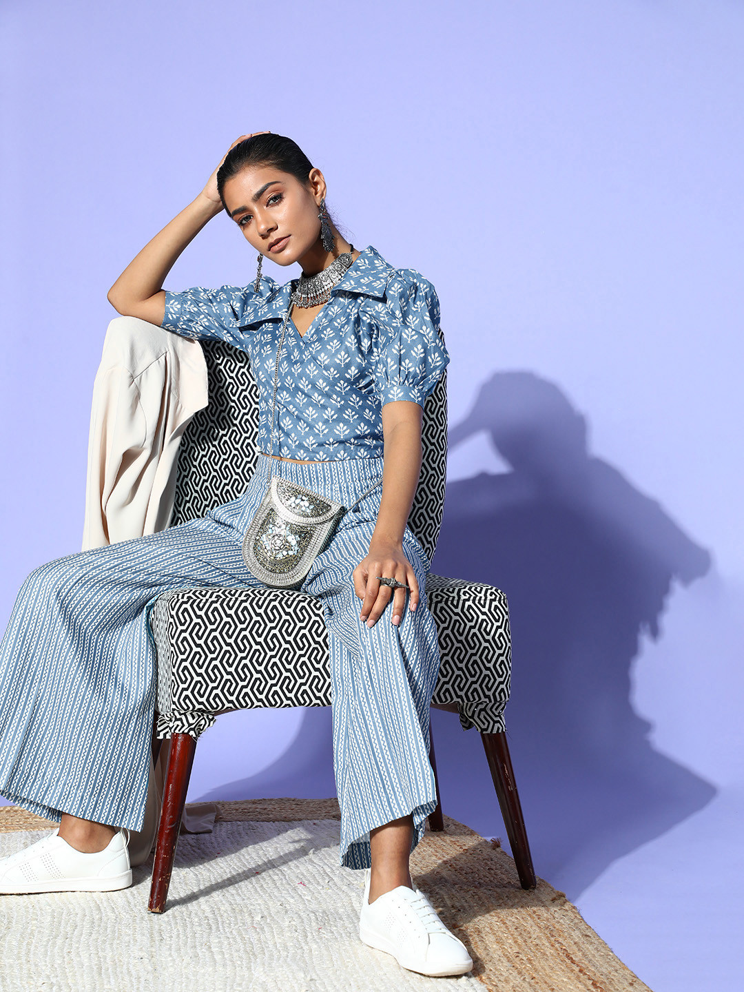 

Inddus Women Stunning Blue Printed Top with Palazzos