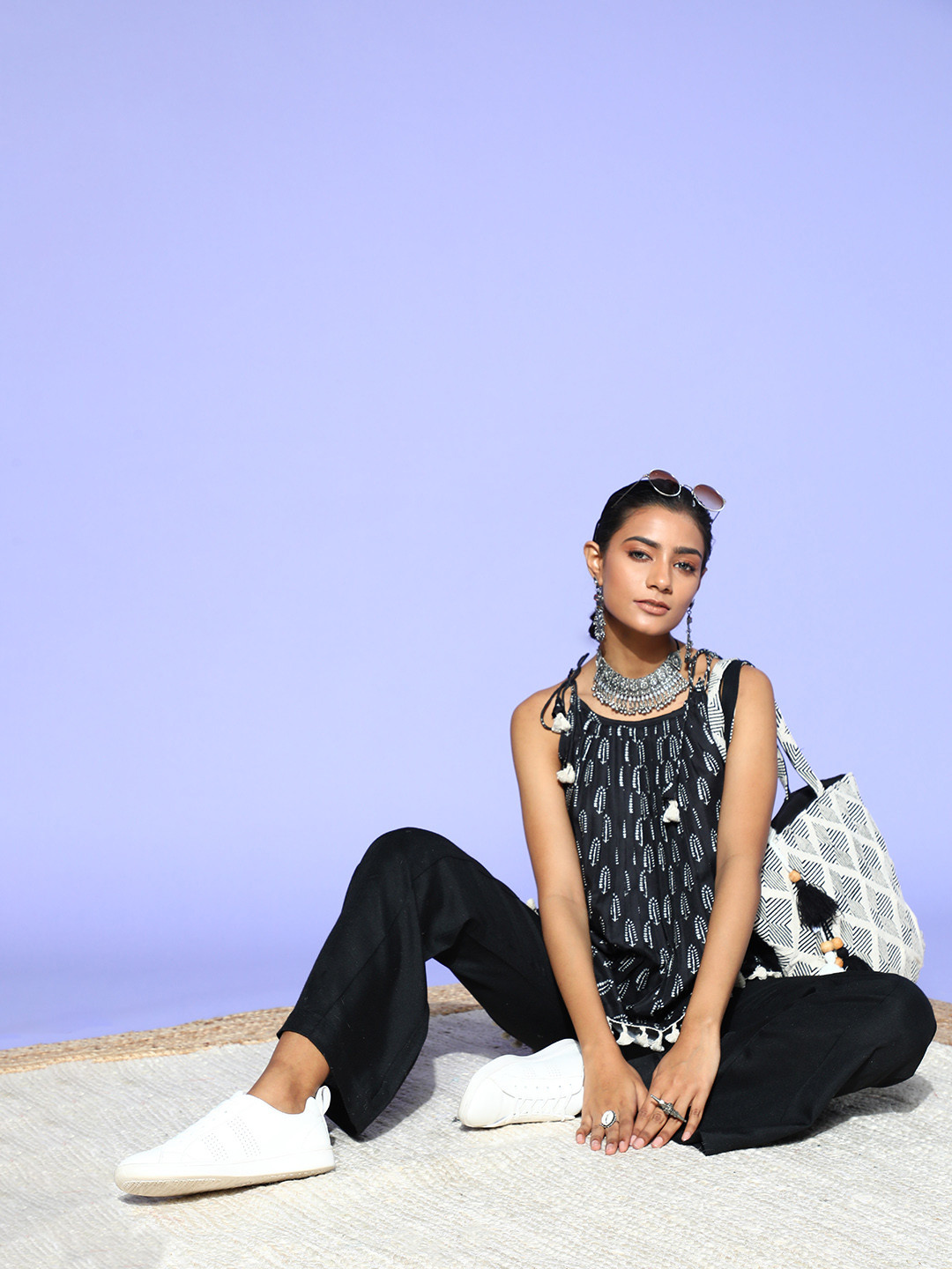 

Inddus Women Stylish Black Printed Top with Solid Trousers