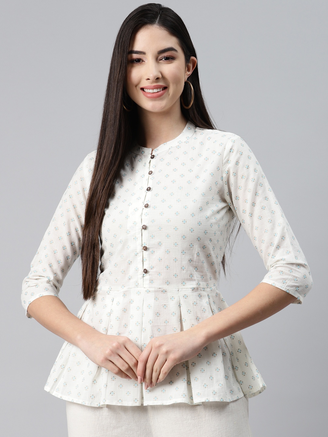 

MALHAAR White Ethnic Motifs Printed Cambric Pleated Kurti