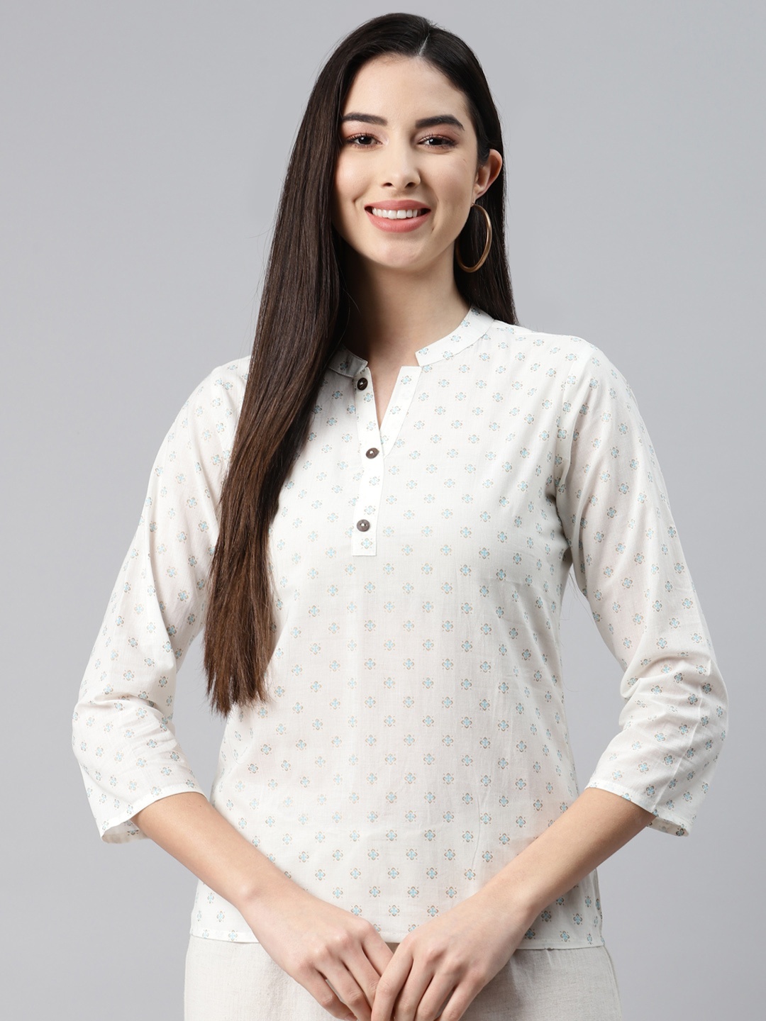 

MALHAAR White Ethnic Motifs Printed Cambric Kurti