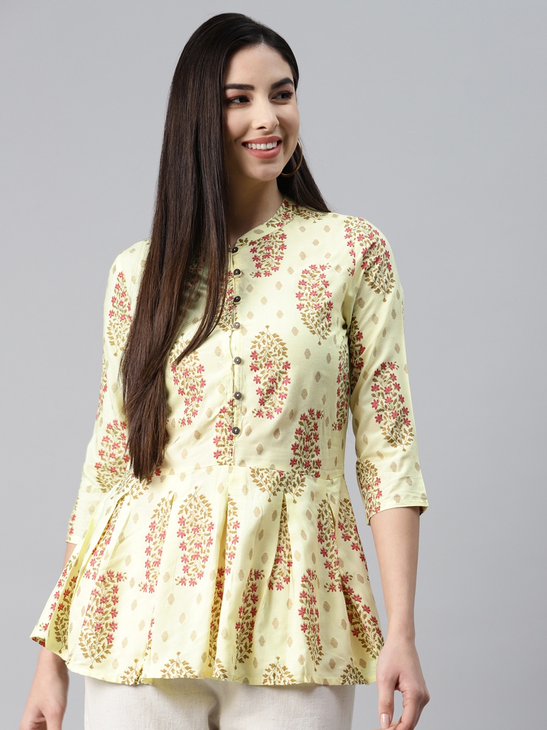 

MALHAAR Yellow Paisley Printed Cambric Pleated Kurti