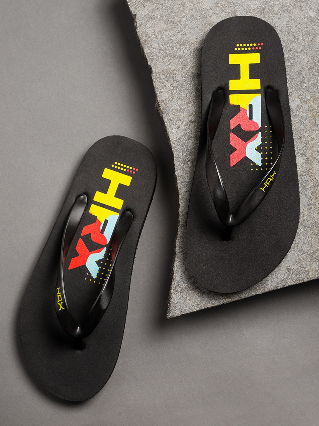 

HRX by Hrithik Roshan Men Black & Yellow Brand Logo Printed Thong Flip-Flops