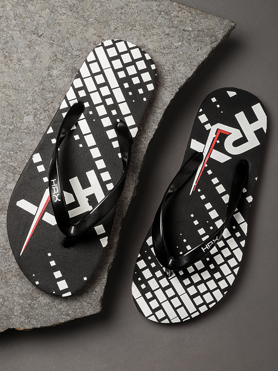 

HRX by Hrithik Roshan Men Black & White Printed Thong Flip-Flops