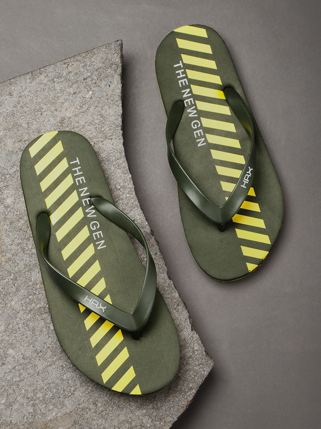

HRX by Hrithik Roshan Men Olive Green & Yellow Striped Thong Flip-Flops
