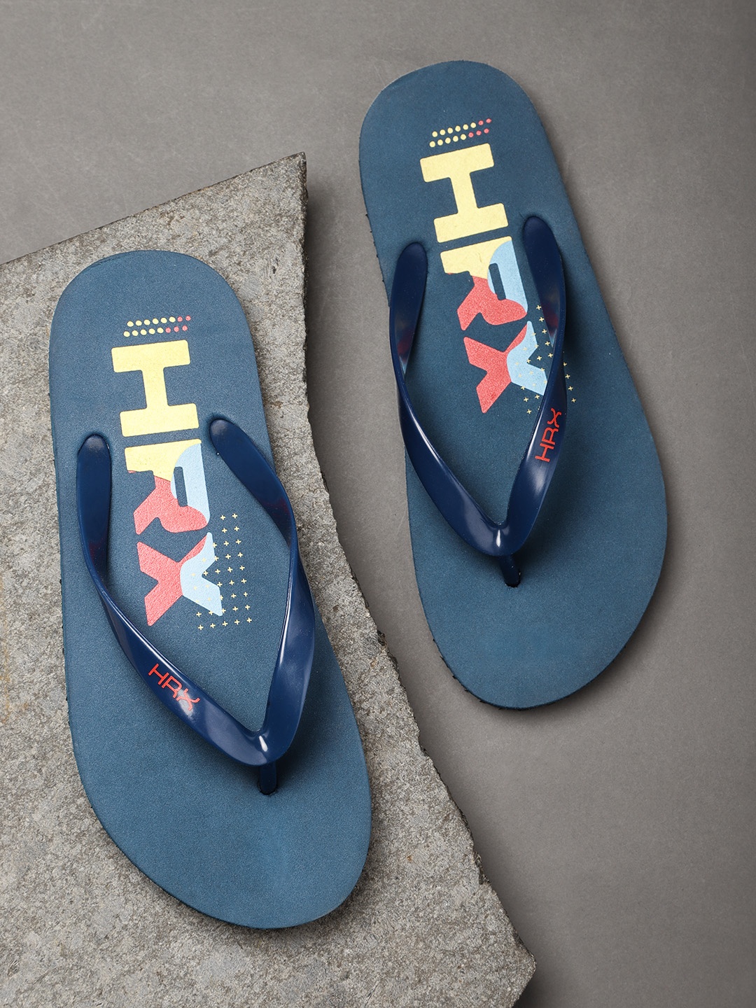 

HRX by Hrithik Roshan Men Blue & Yellow Brand Logo Printed Thong Flip-Flops