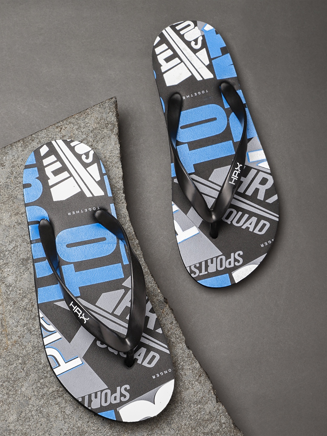 

HRX by Hrithik Roshan Men White & Blue Typography Printed Thong Flip-Flops