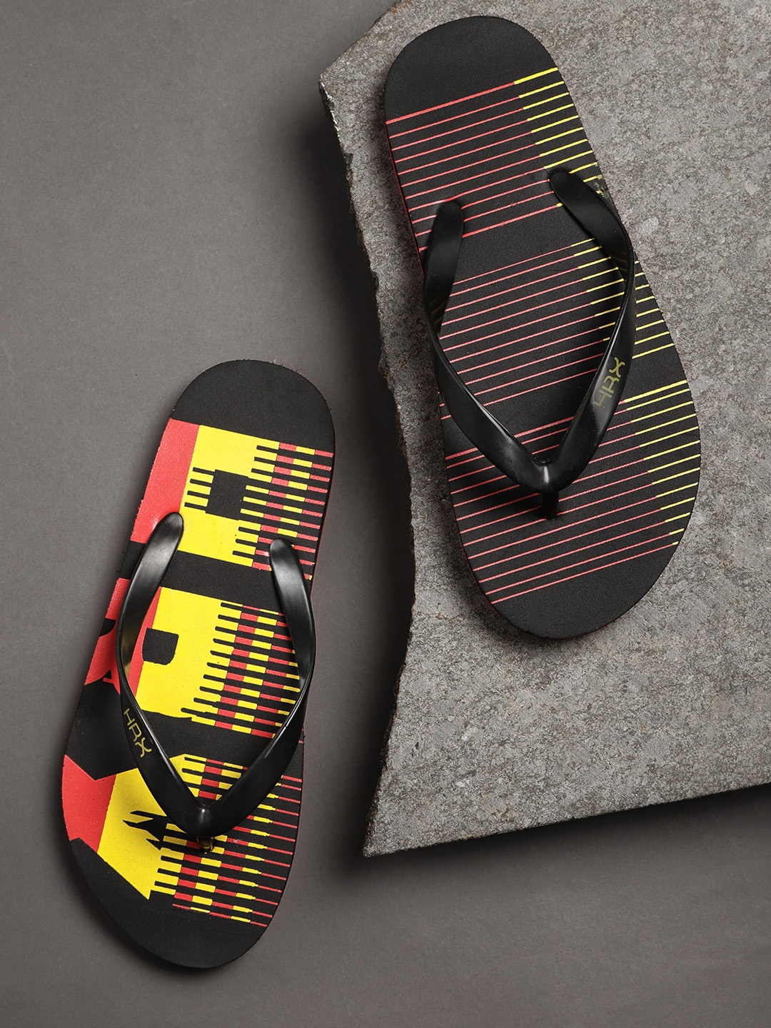 

HRX by Hrithik Roshan Men Black & Red Printed Thong Flip-Flops
