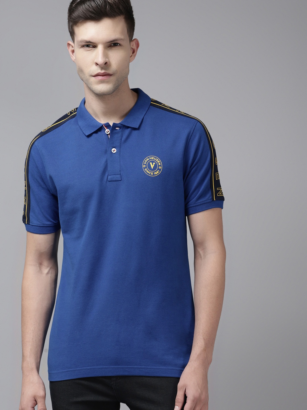 

Van Heusen Sport Men Blue Solid Polo Collar Pure Cotton Applique T-shirt