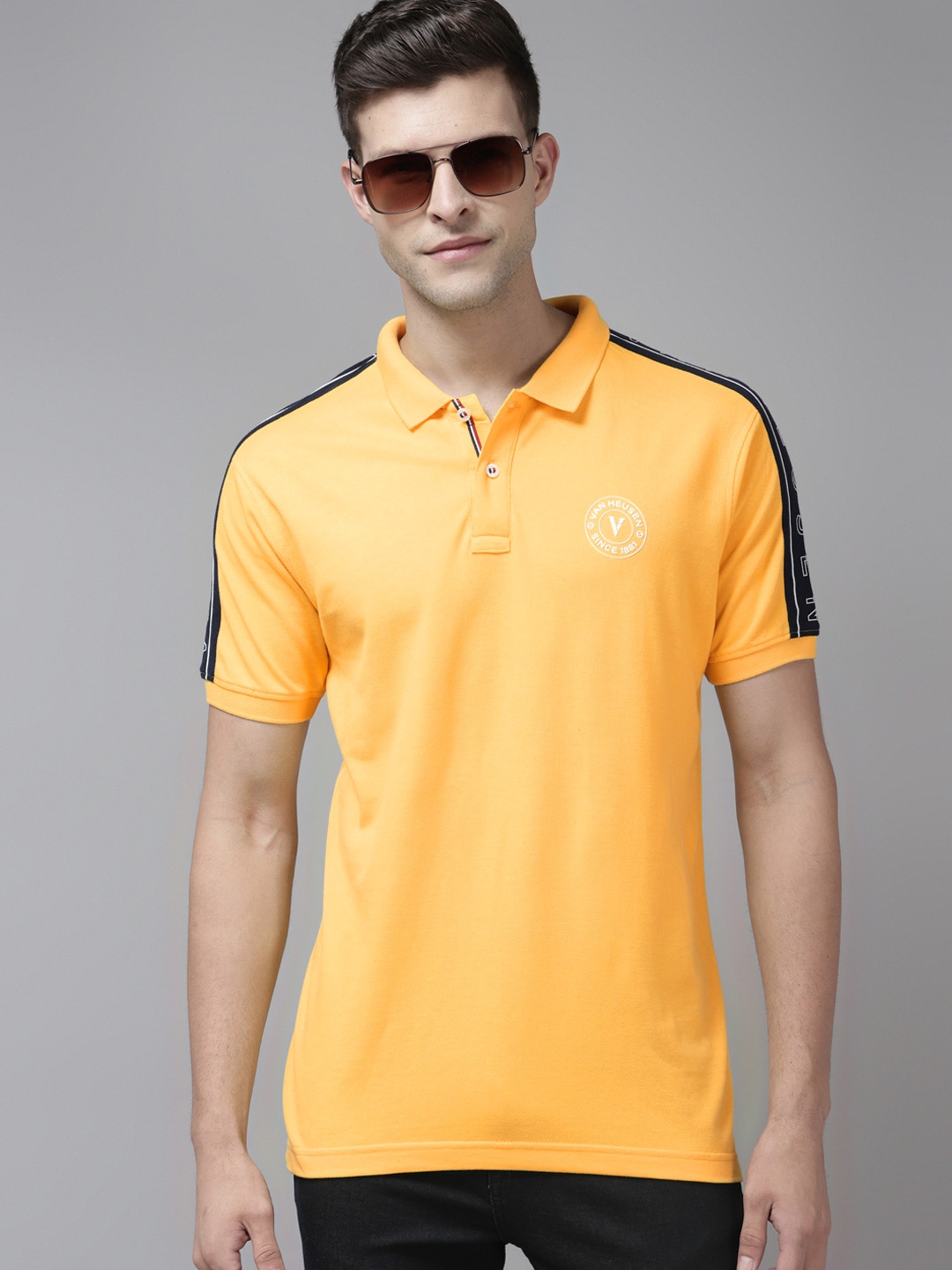 

Van Heusen Sport Men Yellow Solid Polo Collar Pure Cotton Applique T-shirt