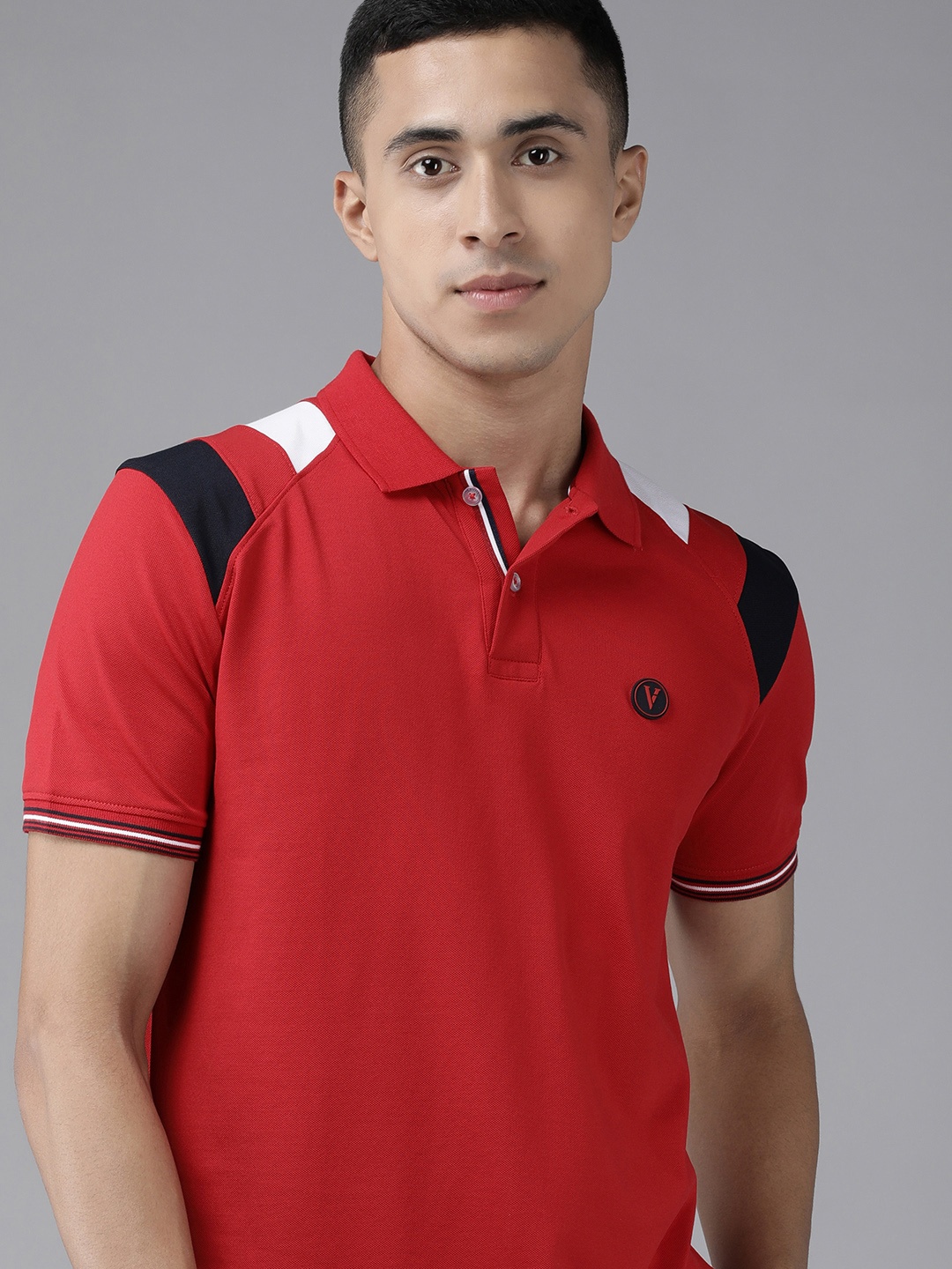 

Van Heusen Sport Men Red Polo Collar T-shirt With Colourblocked Detailing