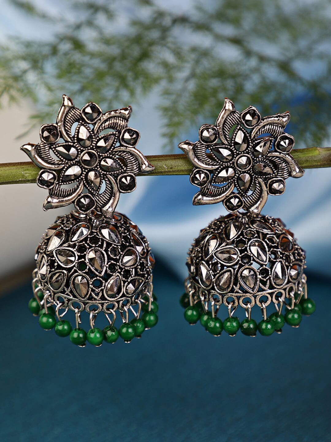 

Shining Diva Silver-Plated Green Dome Shaped Jhumkas Earrings