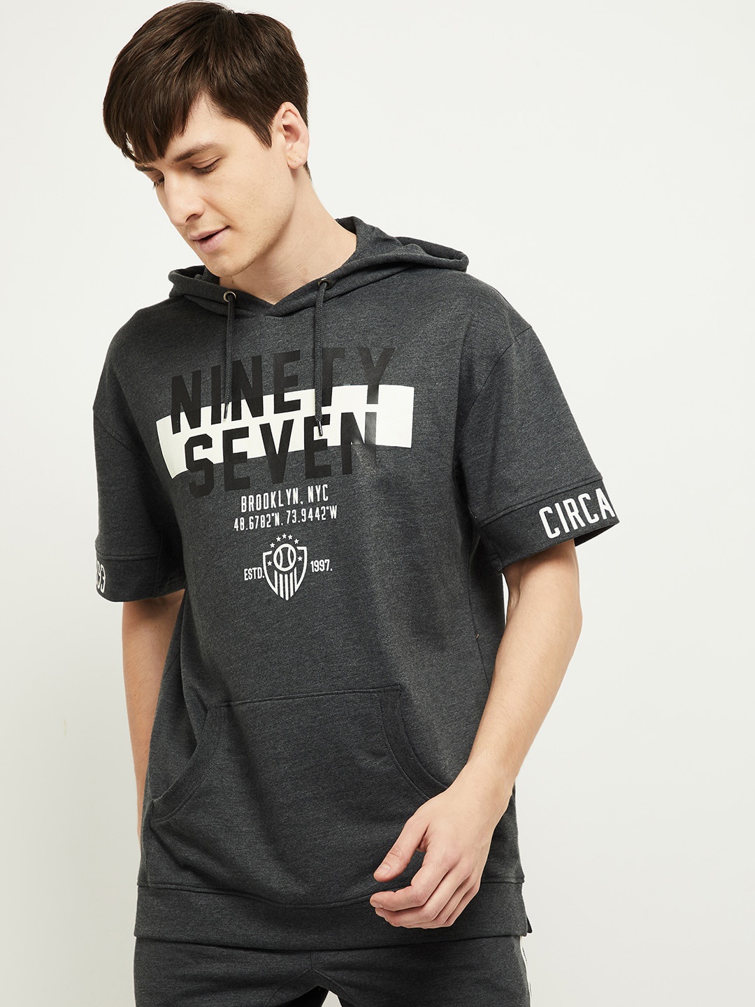 

max Men Black Typography Printed Hooded Sweatshirt
