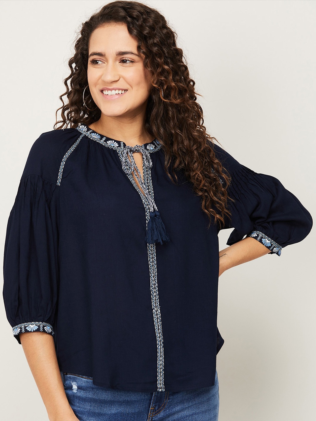 

Fame Forever by Lifestyle Navy Blue & White Floral Embroidered Tie-Up Neck Top