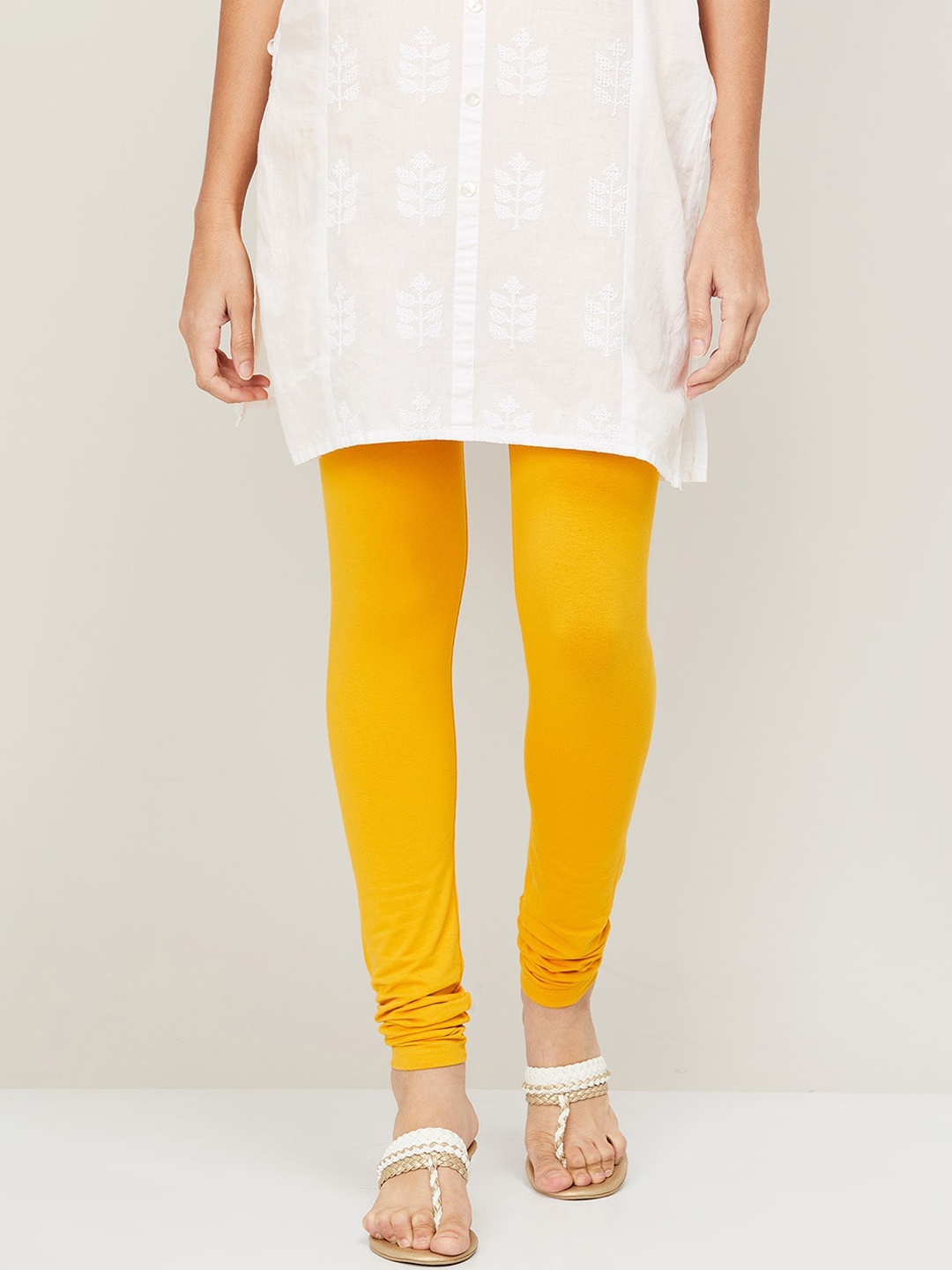 

Melange by Lifestyle Women Solid Yellow Cotton Churidar