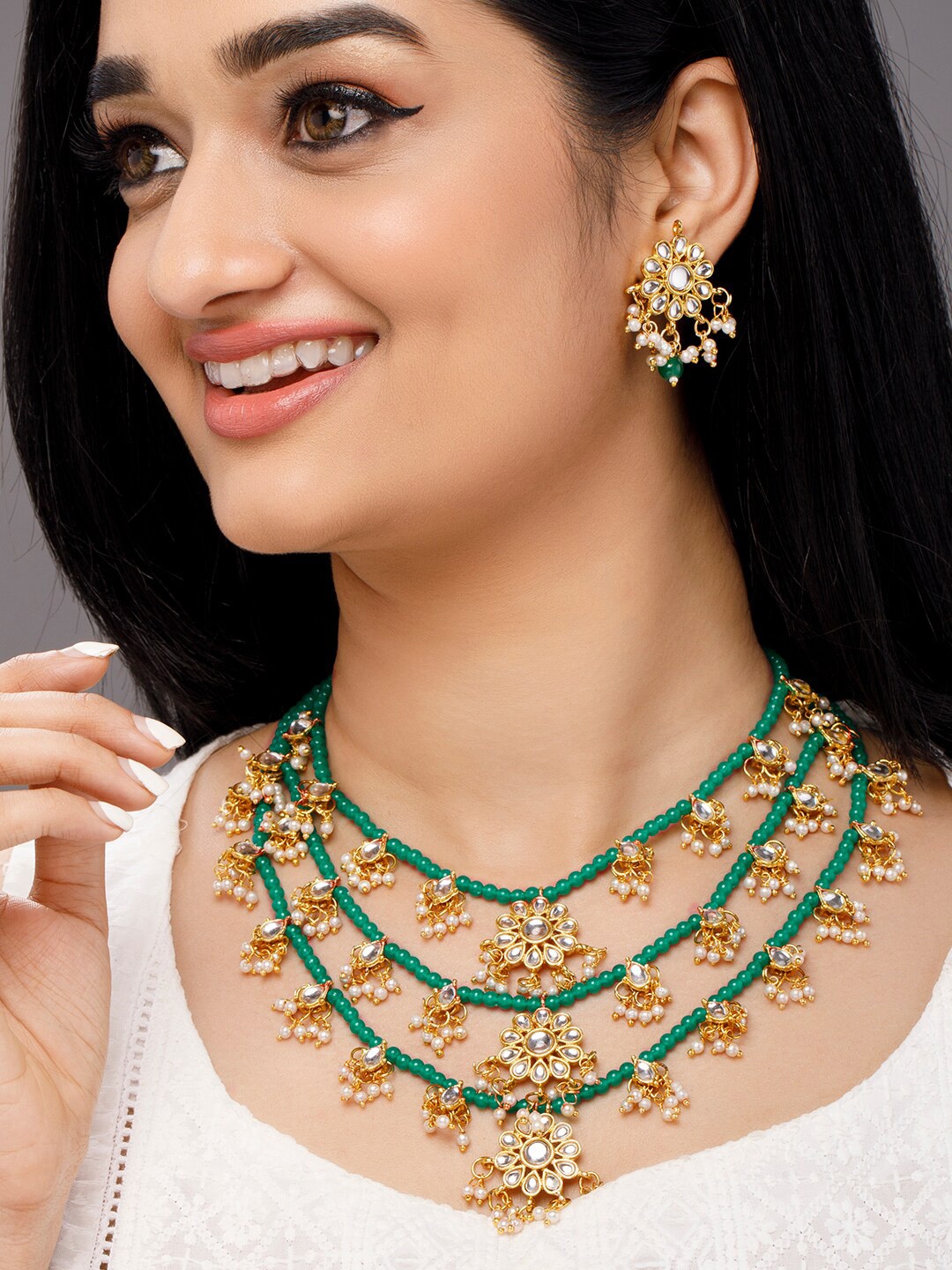 

Anouk Gold-Plated White Kundan-Studded Green Beaded Layered Jewellery Set