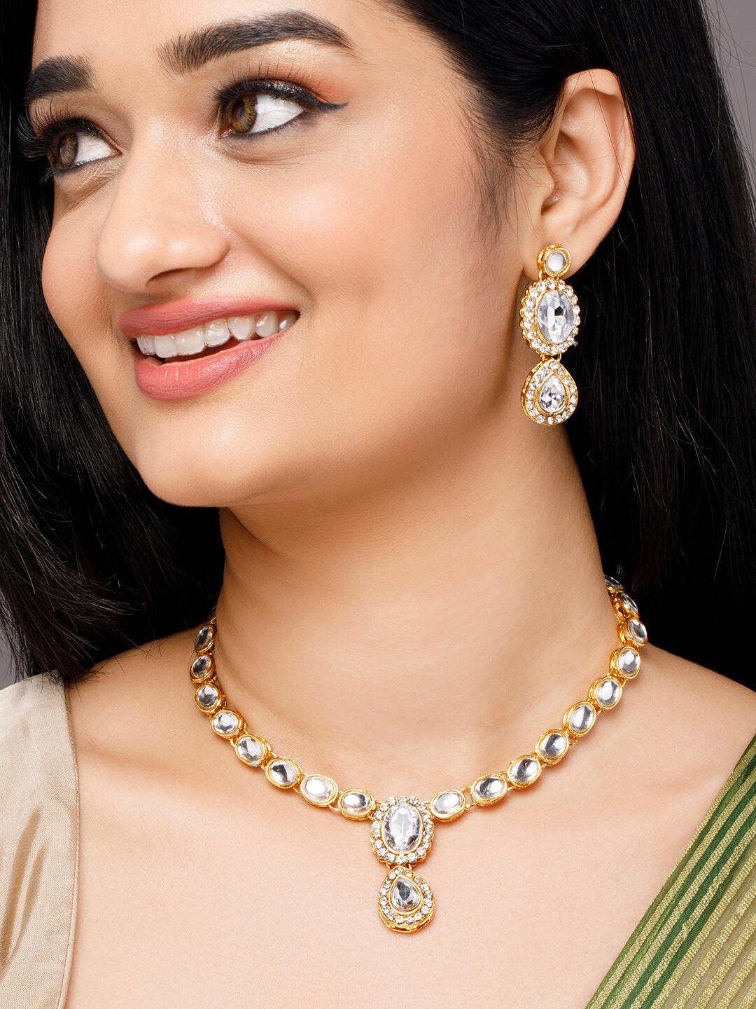 

Anouk omen Gold & White-Toned AD Studded Jewellery Set