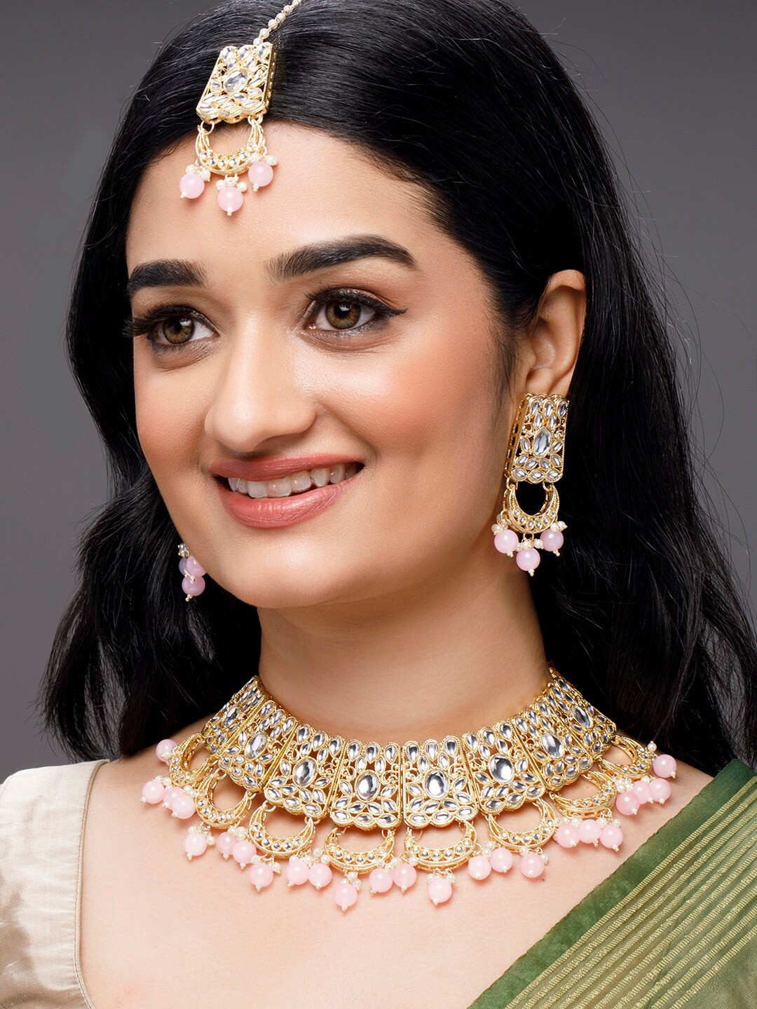 

Anouk Woman Gold-Plated & White Kundan-Studded & Beaded Jewellery Set