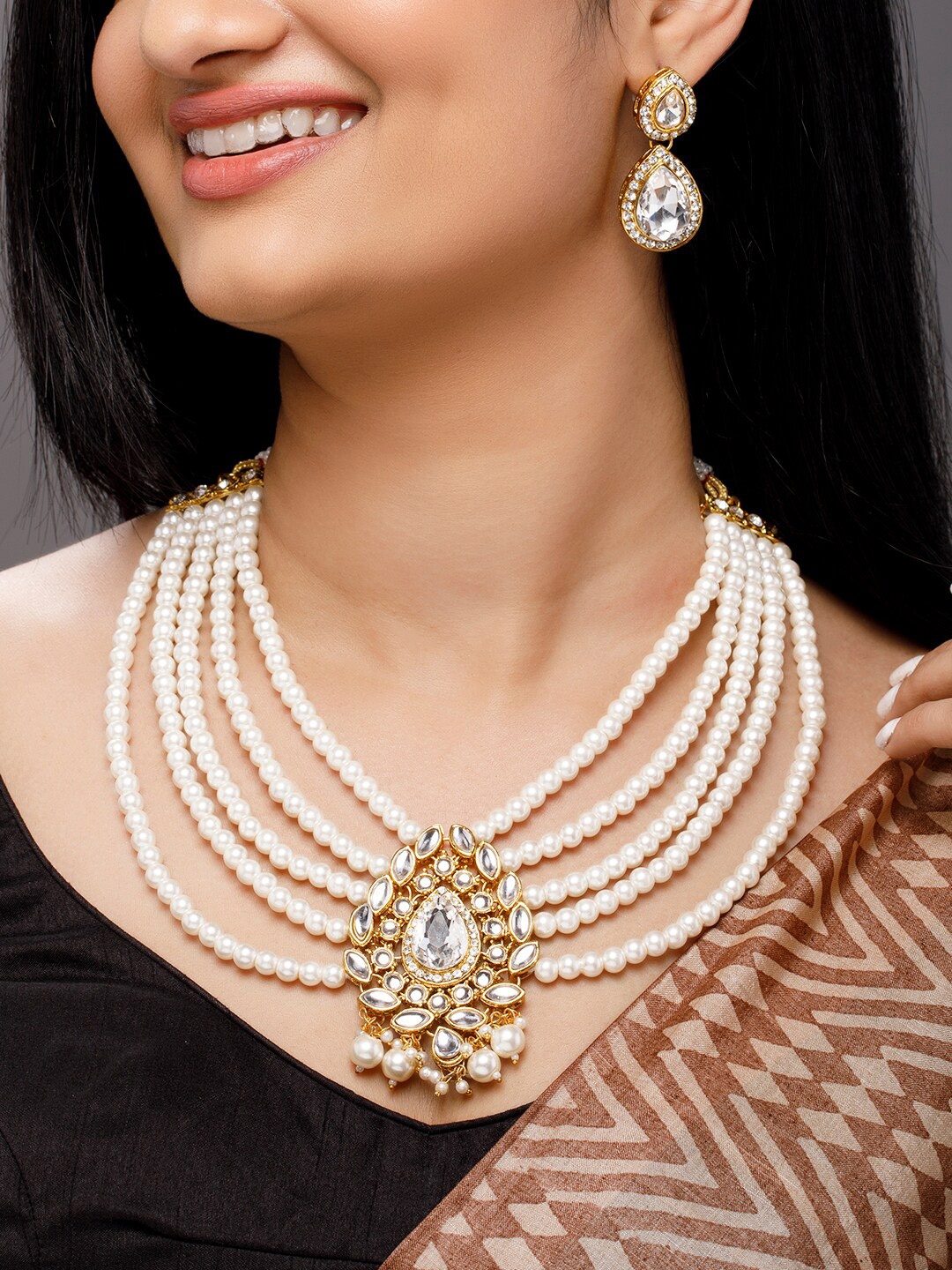 

Anouk Gold & White-Toned Pearl & Ad Studded Layered Jewellery Set