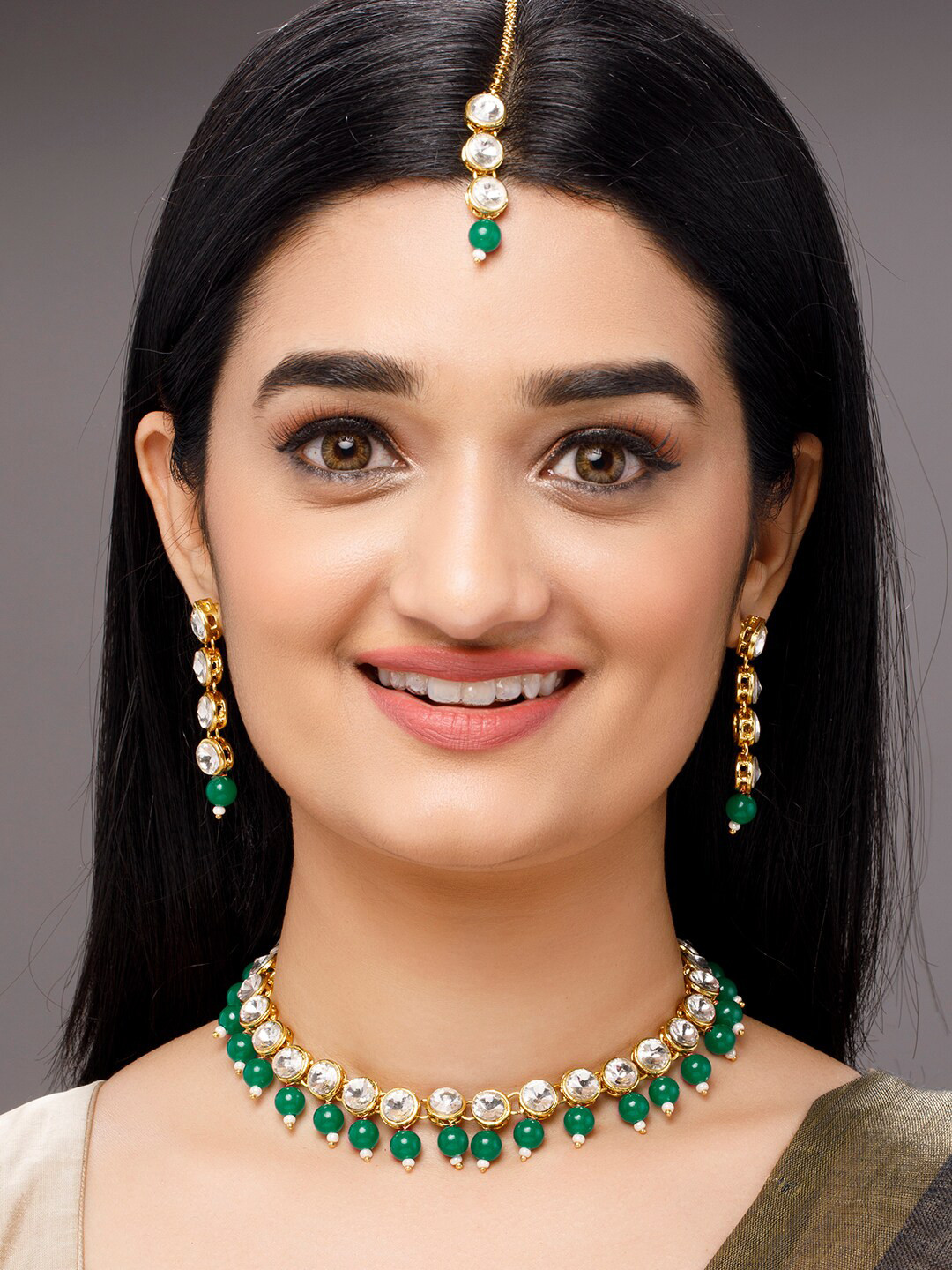 

Anouk Gold-Plated & White Kundan-Studded & Beaded Jewellery Set