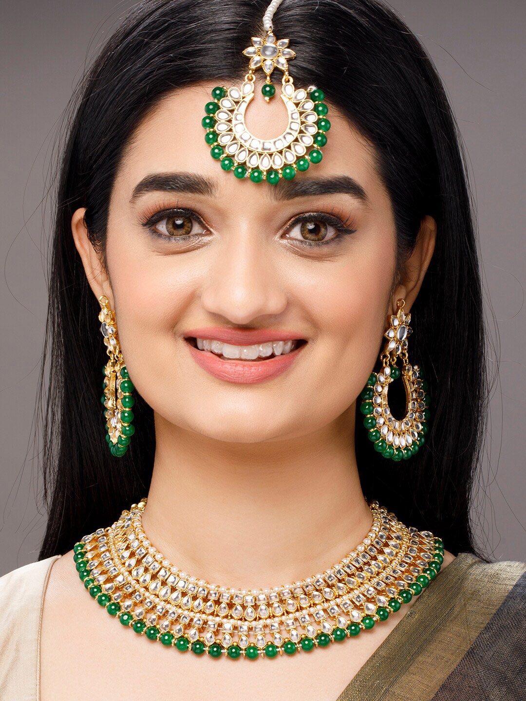 

Anouk Gold-Toned Green Kundan Studded Necklace Set