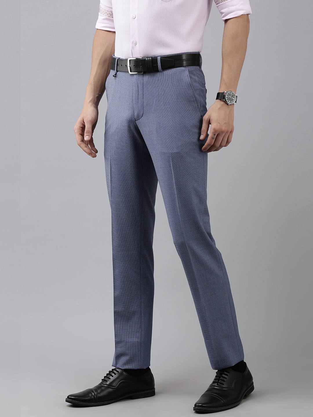 

Van Heusen Men Blue Textured Self Design Slim Fit Mid-Rise Plain Woven Formal Trousers