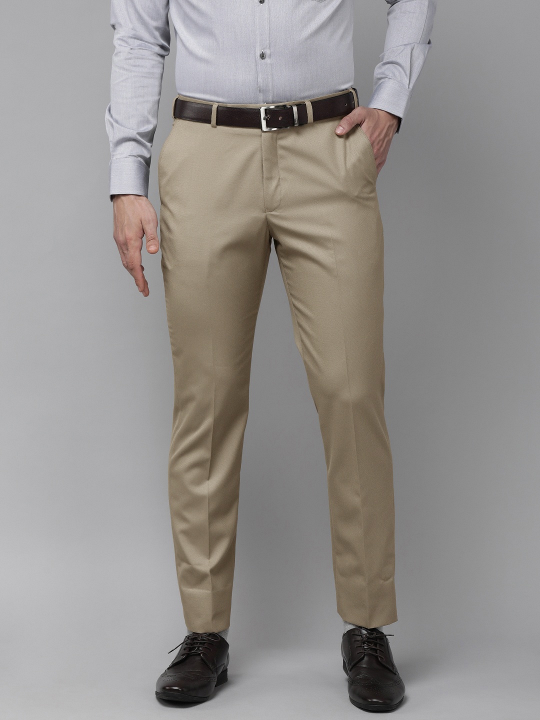 

Park Avenue Men Khaki Solid Mid-Rise Formal Trousers
