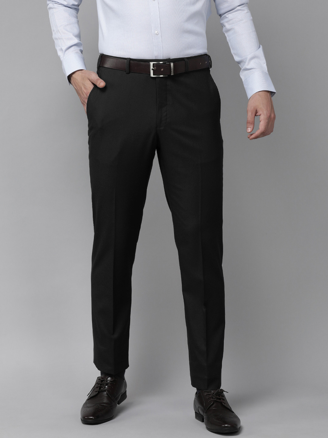 

Park Avenue Men Black Solid Mid-Rise Formal Trousers
