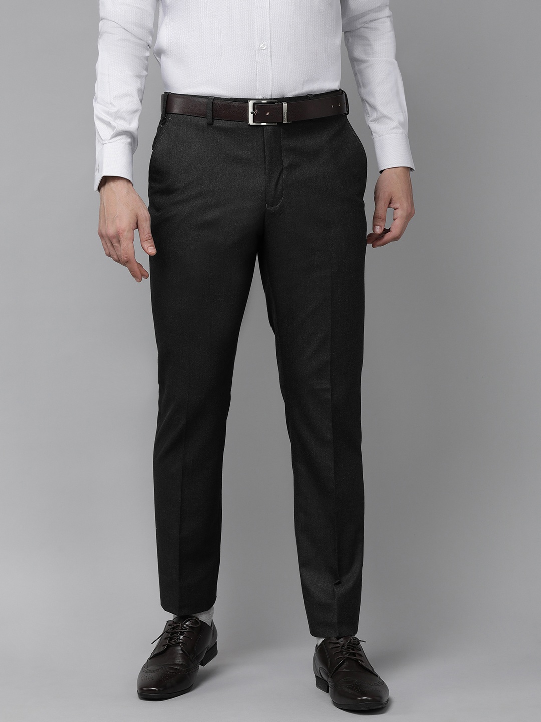 

Park Avenue Men Black Solid Mid-Rise Formal Trousers