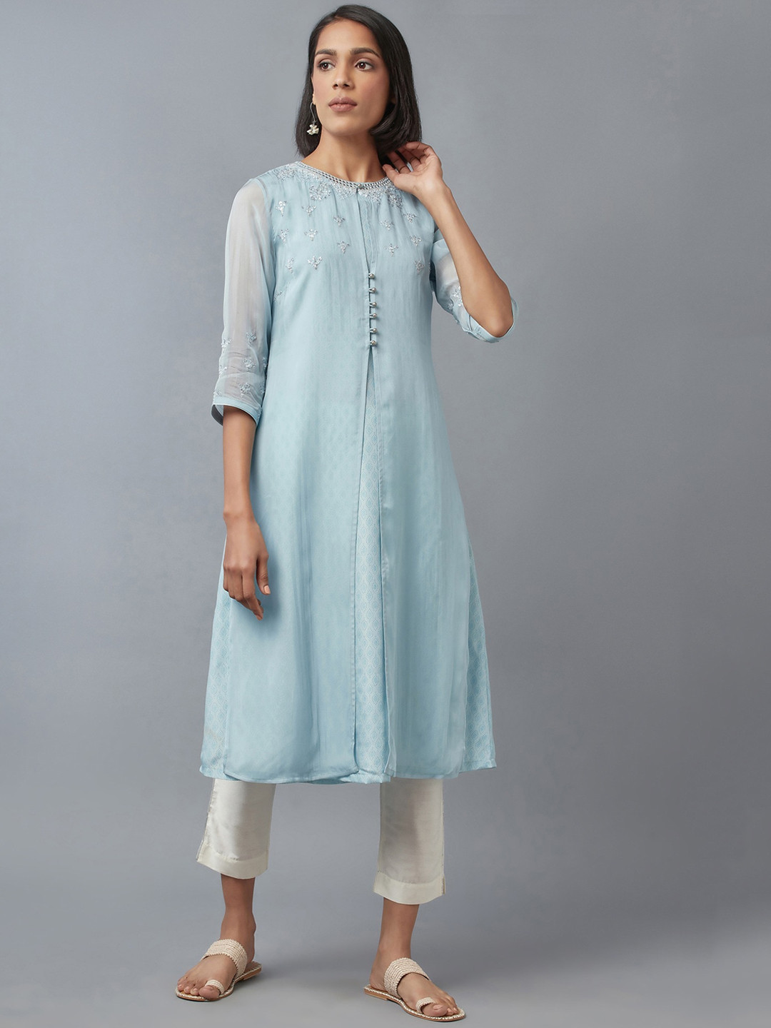 

WISHFUL Women Turquoise Blue & White Yoke Design Layered Sequinned Kurta with Trousers