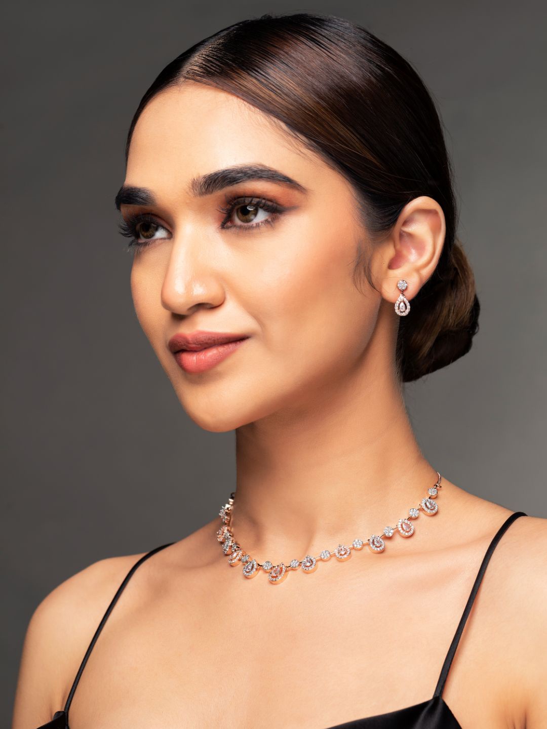 

Priyaasi Rose Gold-Plated & White AD-Studded Jewellery Set