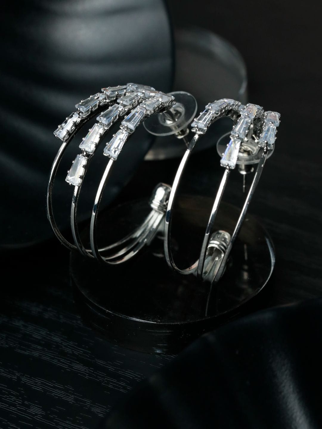 

Priyaasi Silver-Plated AD-Studded Contemporary Half Hoop Earrings