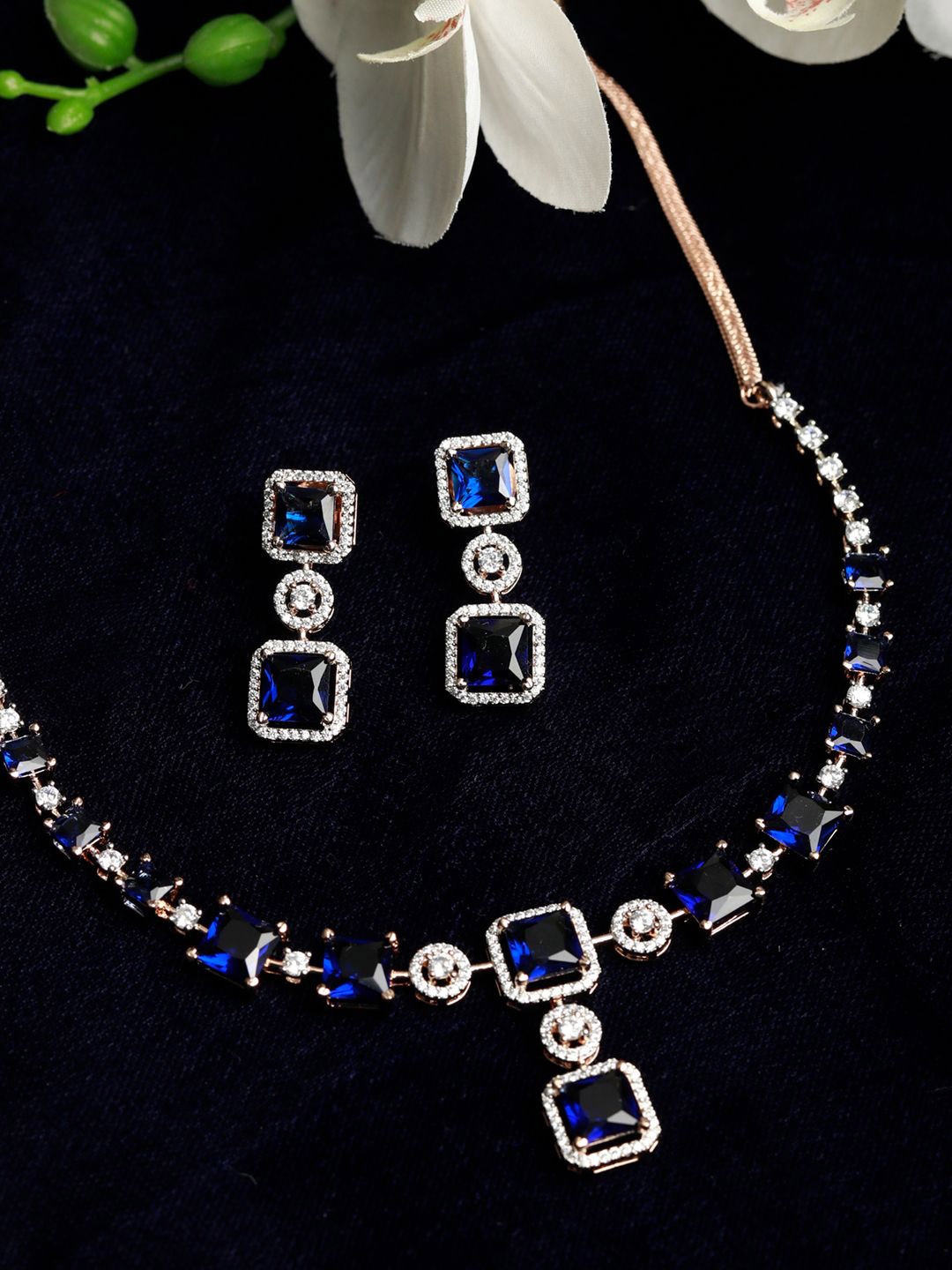 

Priyaasi Rose Gold-Plated White & Blue AD-Studded Elegant Jewellery Set