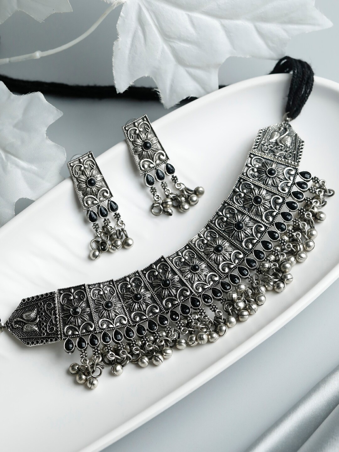

Priyaasi Oxidised Silver-Plated Black Stone Studded Floral Jewellery Set