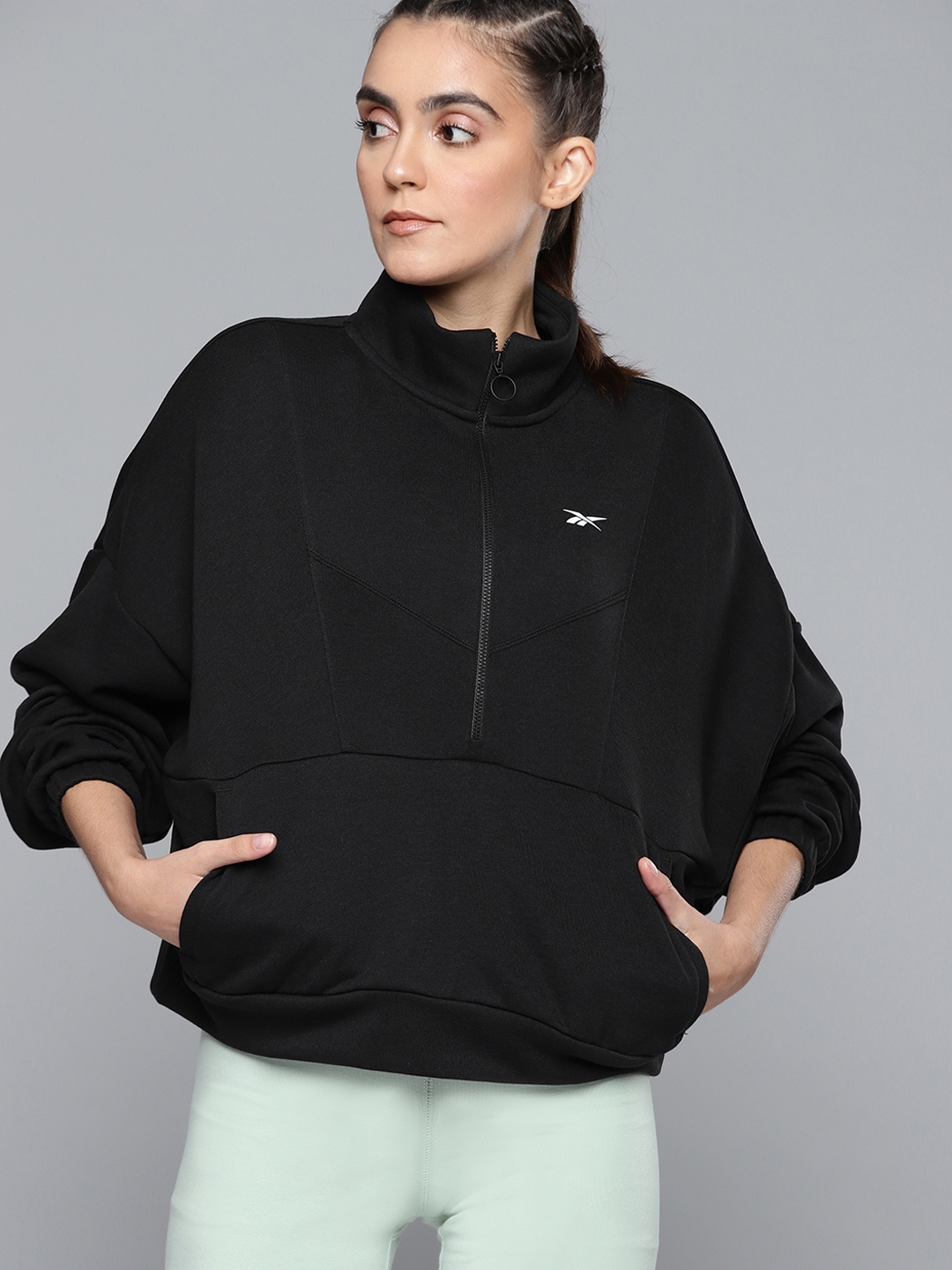 

Reebok Women Black Solid Brand Logo Print Detail Sweatshirt