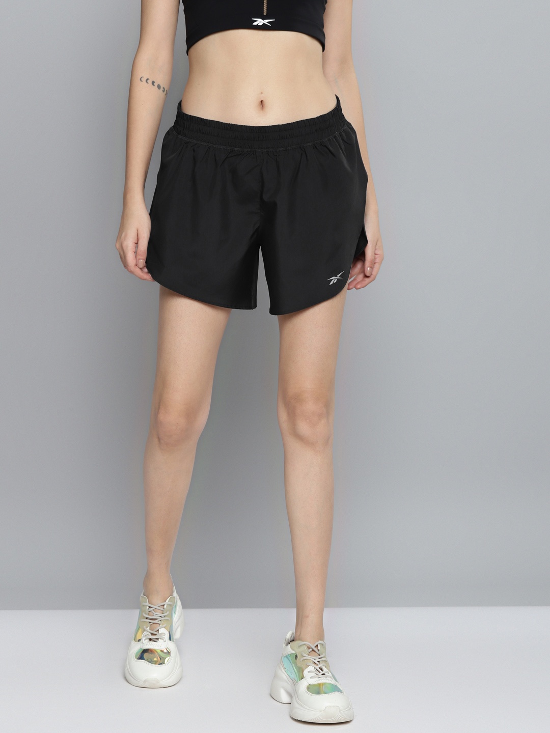 

Reebok Women Black Printed WOR RUN S Sports Shorts