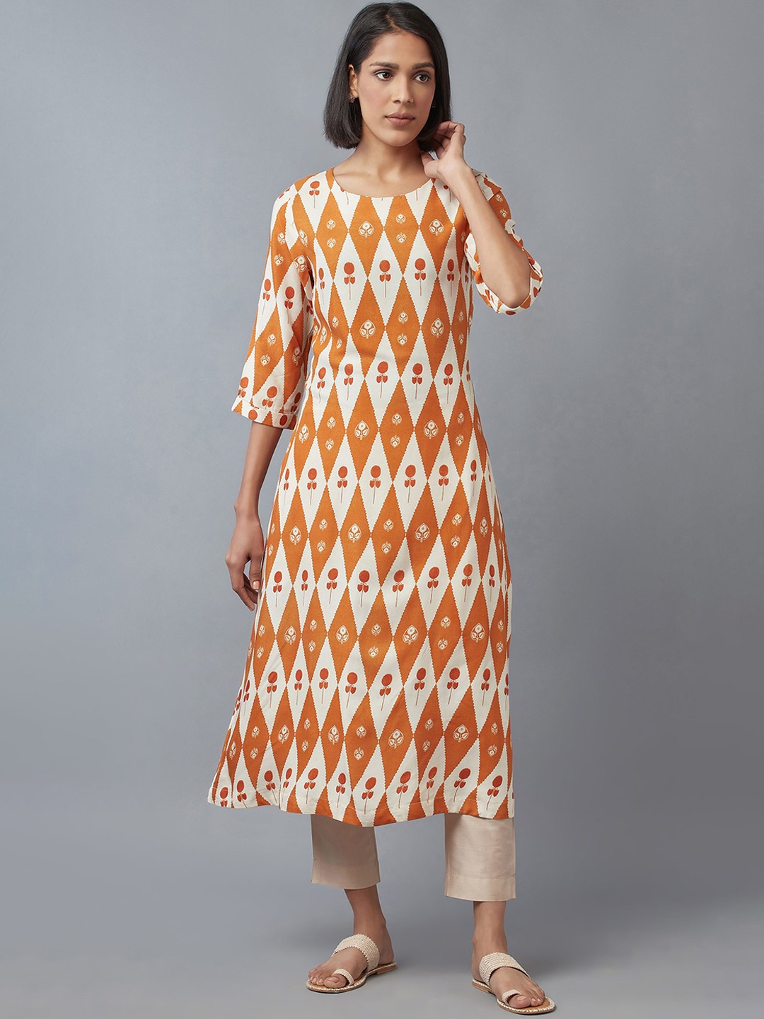 

W Women Orange Geometric Printed Flared Sleeves Kurta