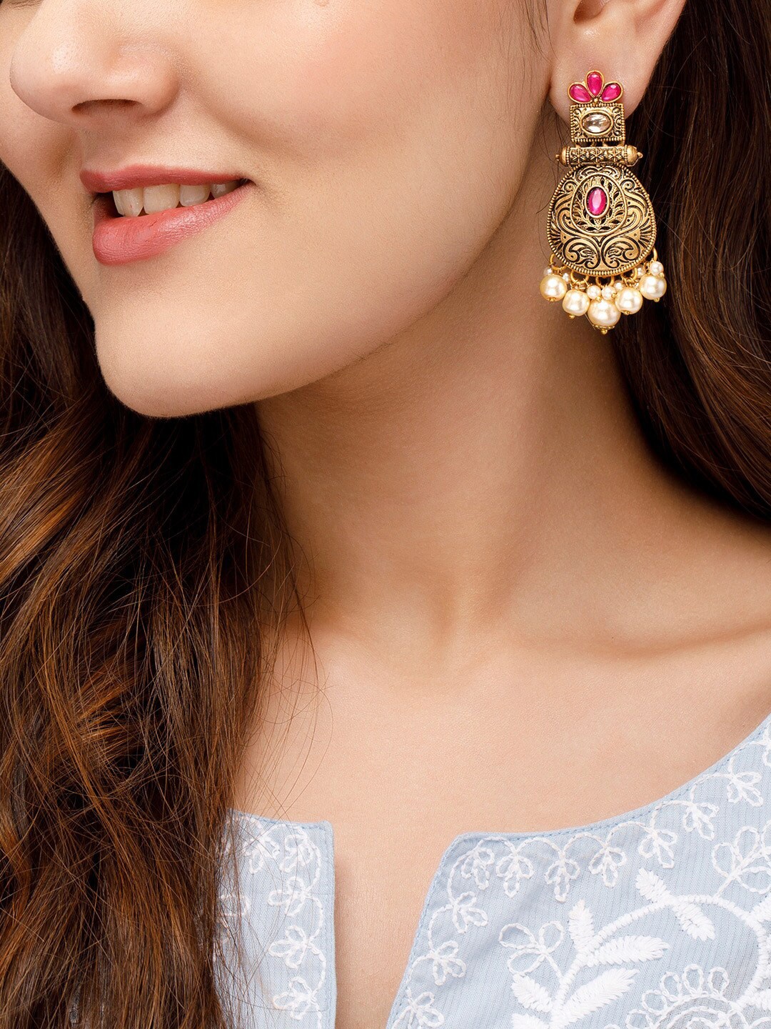 

Rubans Women Gold-Toned & Pink Stone Studded Pearl Beaded Tear Drop Shaped Drop Earrings