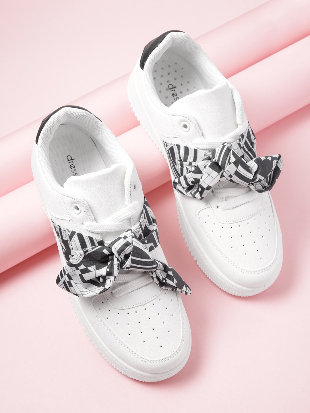 

DressBerry Women White Solid Perforated Sneakers