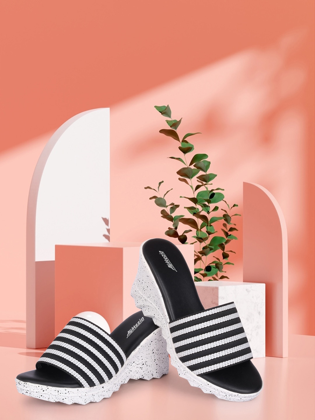 

Alishtezia Black & White Striped PU Wedge Heels