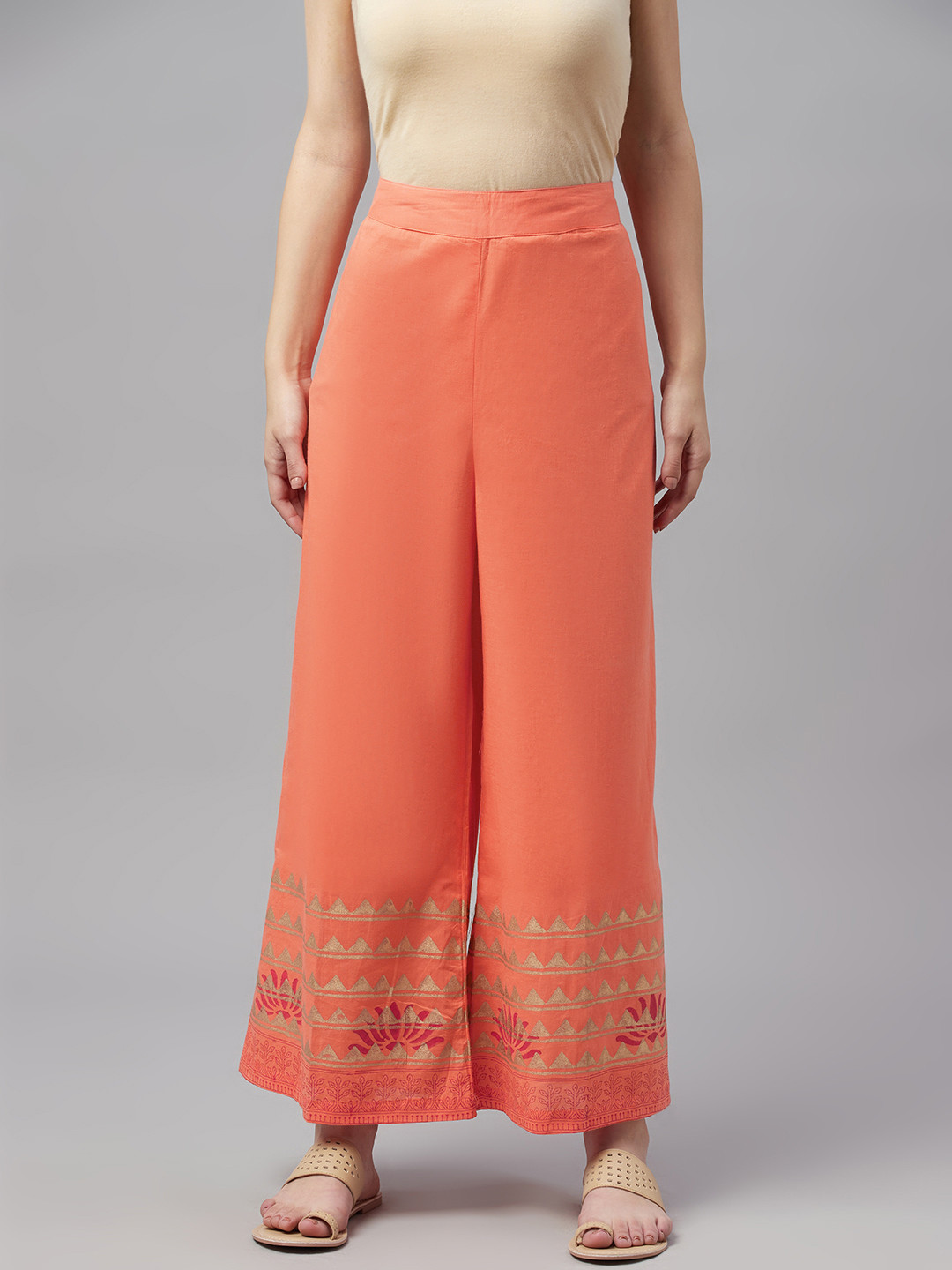 

MBE Women Peach-Coloured & Gold-Toned Pure Cotton Ethnic Motifs Print Palazzos