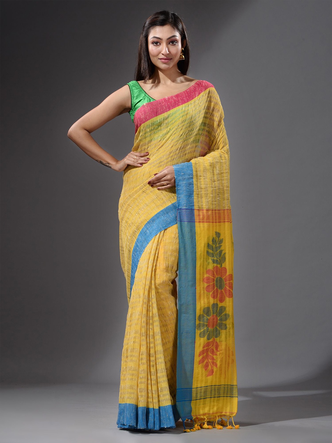 

Charukriti Yellow & Blue Striped Pure Cotton Saree
