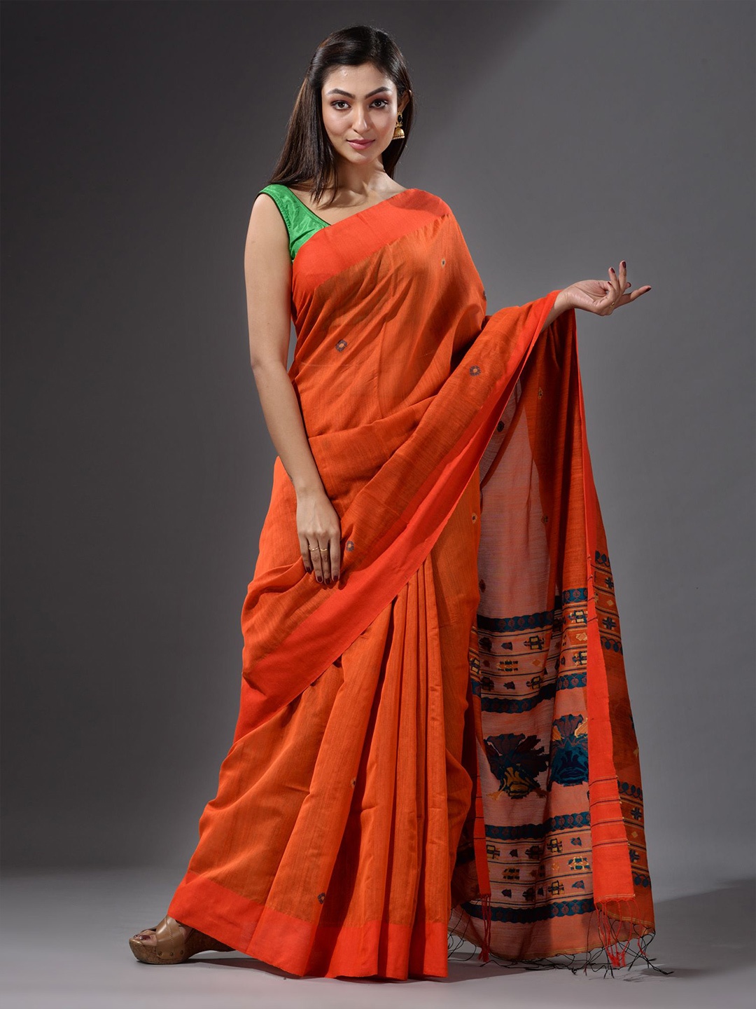 

Charukriti Orange & Teal Woven Design Saree