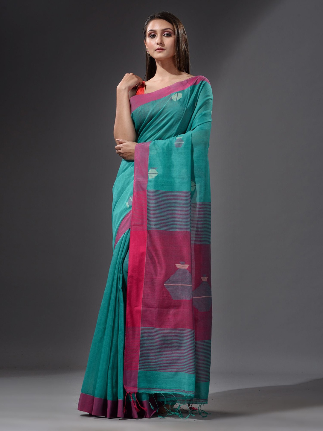

Charukriti Teal & Pink Woven Design Saree